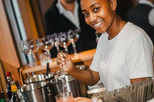The Crew onboard at the bar mixing a cocktail at the  Love Float - Lisboa Boat Party