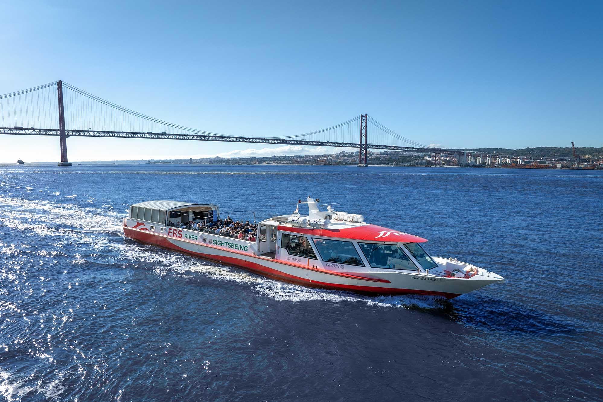 A boat on a river under the blue sky