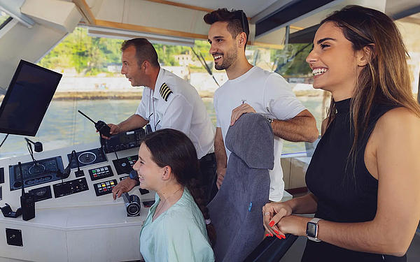 A family and crew members on a FRS ship in Portugal